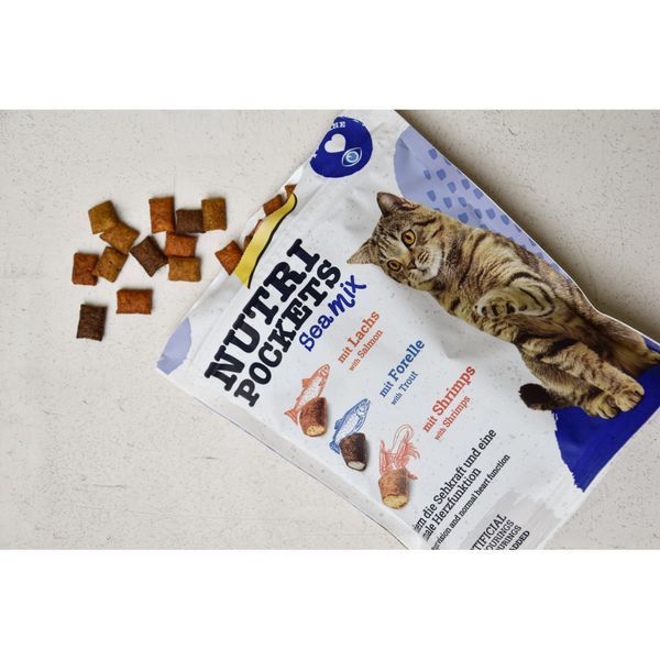 Ласощі вітамінні GimCat Nutri Pockets Морський мікс для котів з лососем фореллю та креветками 150 г 1111164084 фото